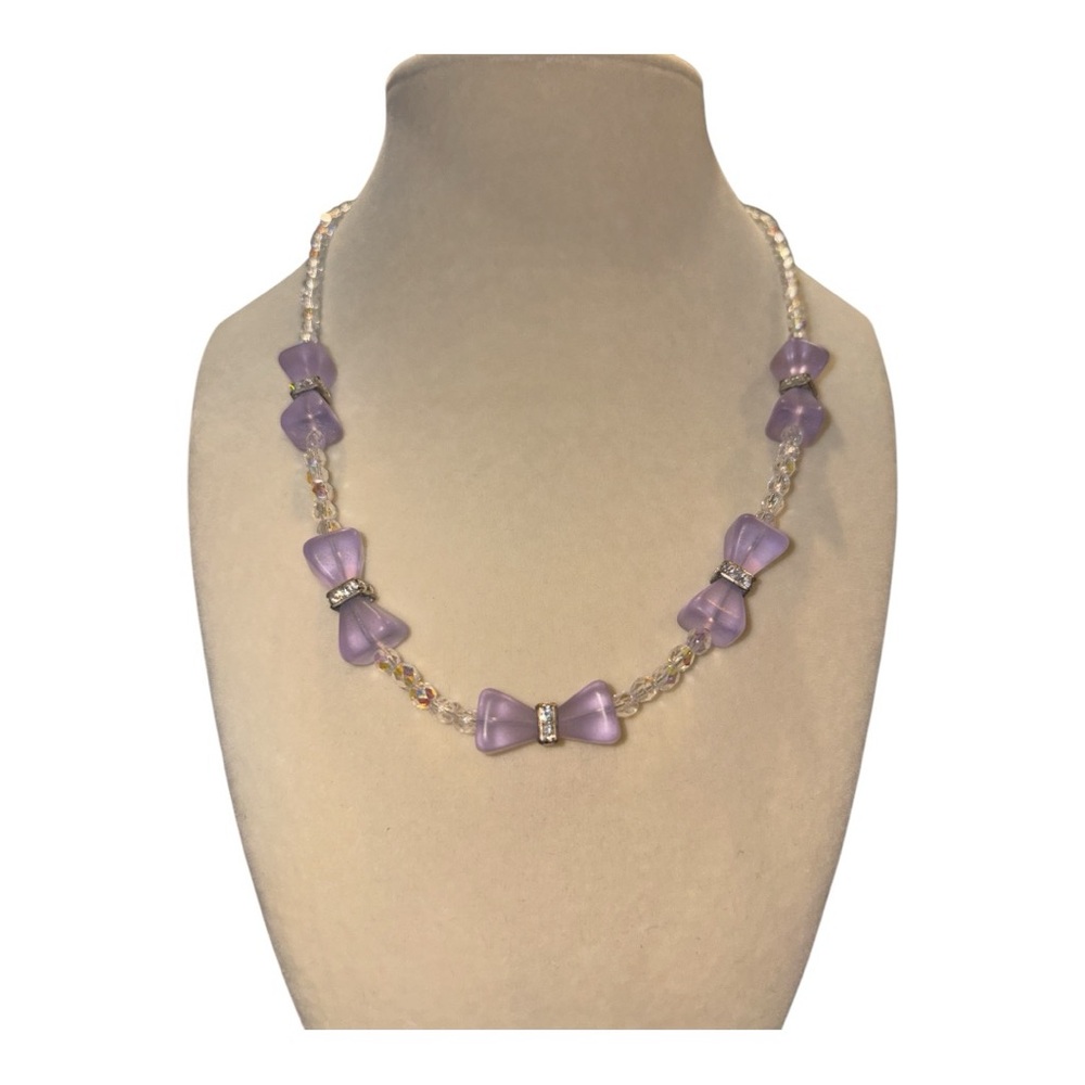 Mena Lavender bows encircled with rhinestones on a crystal beaded chain. RN